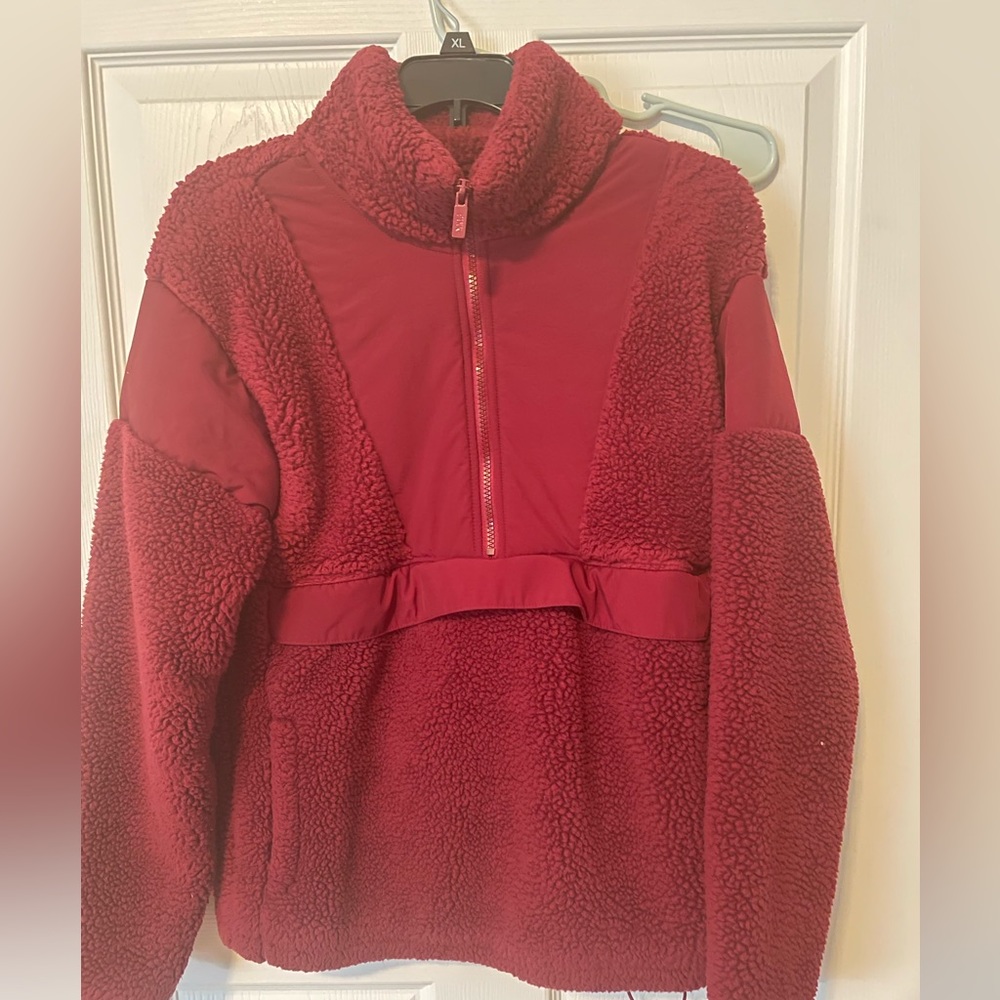 Pink quarter zip up sweater, never worn but no tags